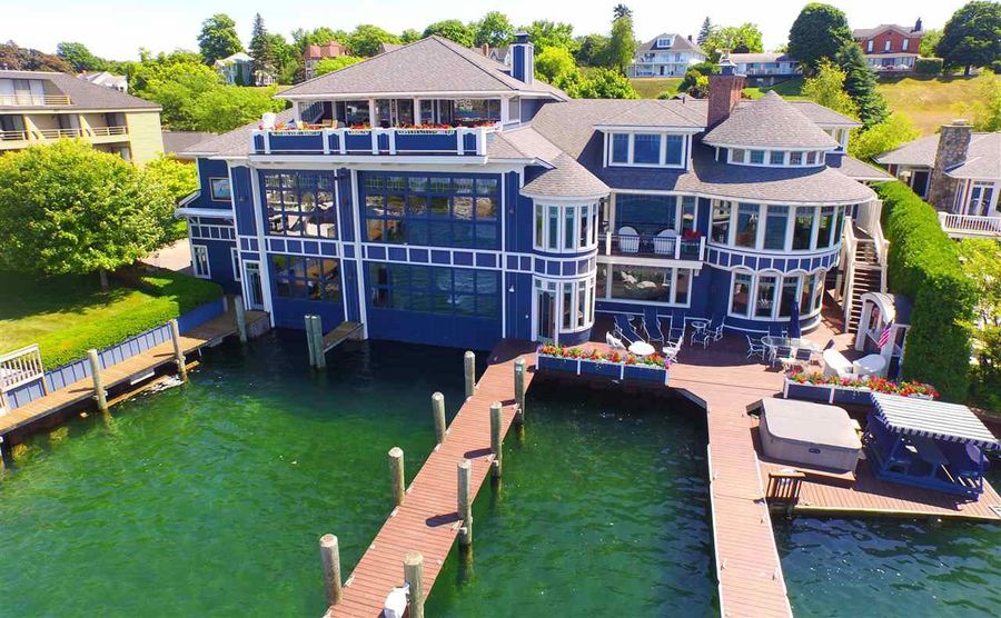 Own a massive boathouse in Charlevoix on Round Lake for 6.8 million